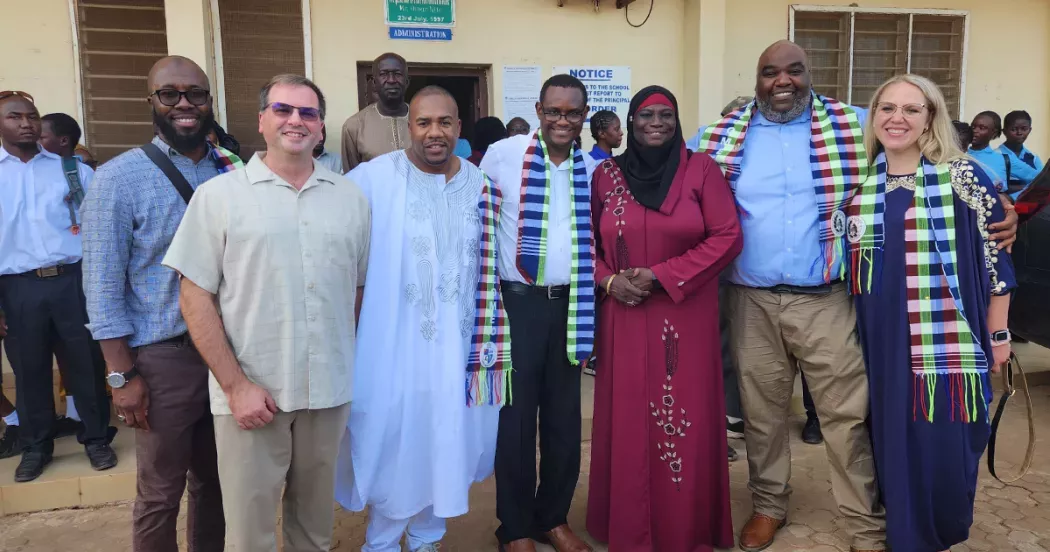 Dr. Geoff Bradshaw with Madison College sister city delegates at the Charles Jaw Secondary School in The Gambia