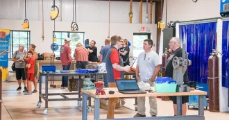 People exploring the Portage Enterprise Center interior