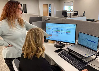 accounting students working on a project