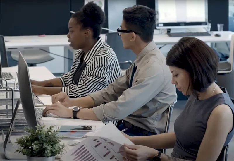 three account students in lab
