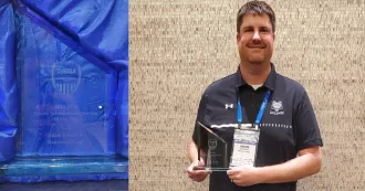 Adam Eichstedt poses with his award.