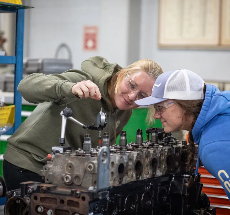 Ag Technician students calibrating a diesel injector