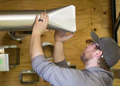 Man Fixing HVAC System