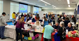 Participants and employers at a past Madison College bilingual job fair.