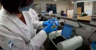 Madison College biotechnology student in lab