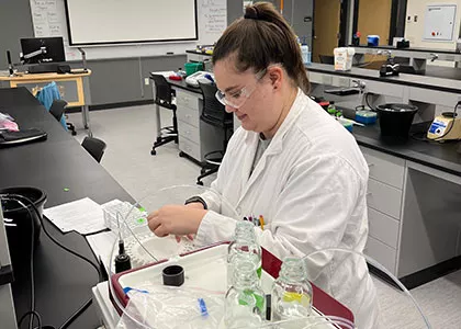 biotechnology student learning in lab