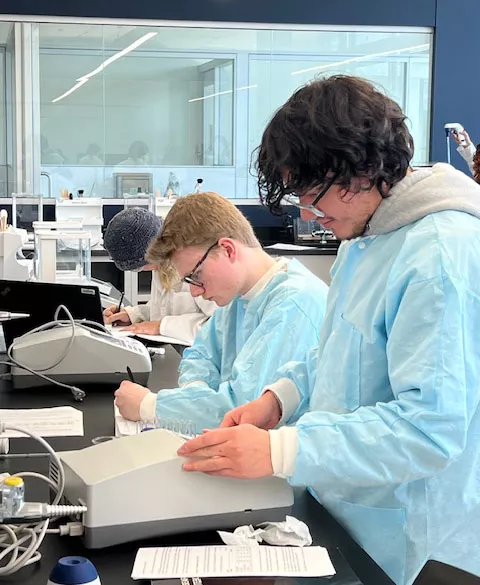 biotechnology students working in lab