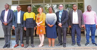 Dr. Geoff Bradshaw and Stephanie Belmas of Madison College with Dr. Sylvie Mucyo, Vice Chancellor of Rwanda Polytechnic and staff commemorate the signing of a new partnership agreement.