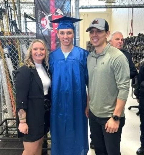 NextGen grad Brock Buskager with instructors Kristy Schnabel and Jesus Villagomez.