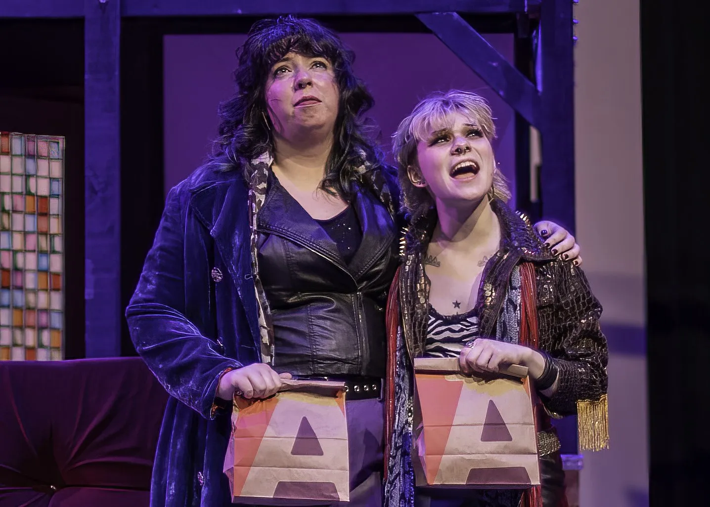 Charly Sparks and another student performing on stage