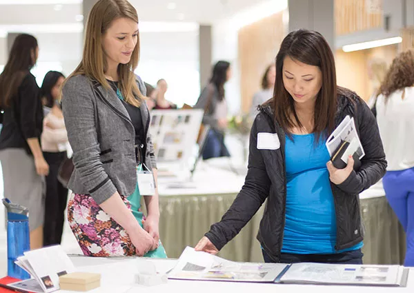 two people reviewing information together