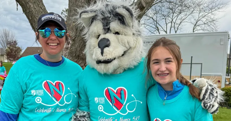 Participants of Celebrate a Nurse celebrate with Wolfie.