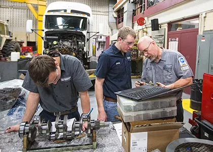 Diesel Equipment Technology Instructor and Students