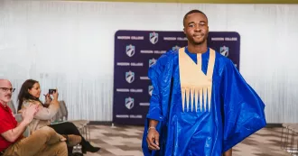 Students walk in fashion show