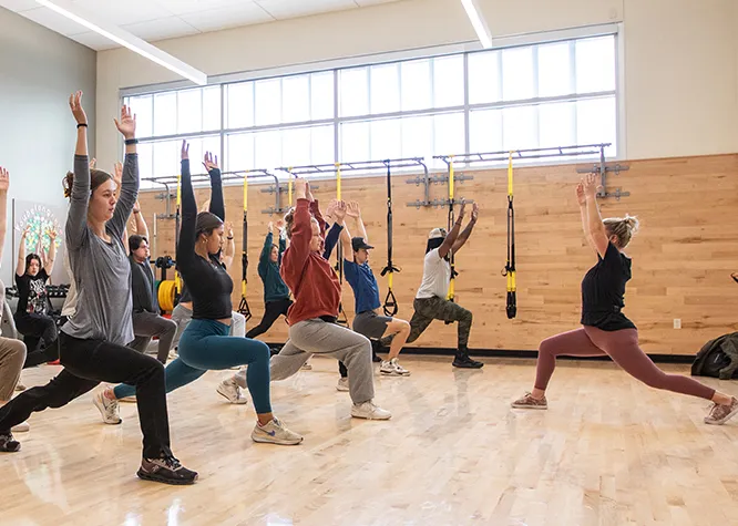 madison college students participating in a group fitness class