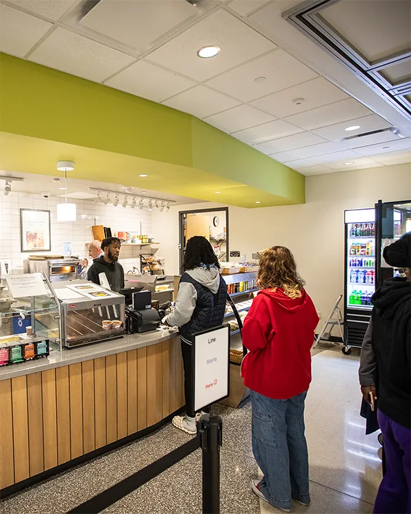 Students waiting in line at the Goodman South Campus Cafe