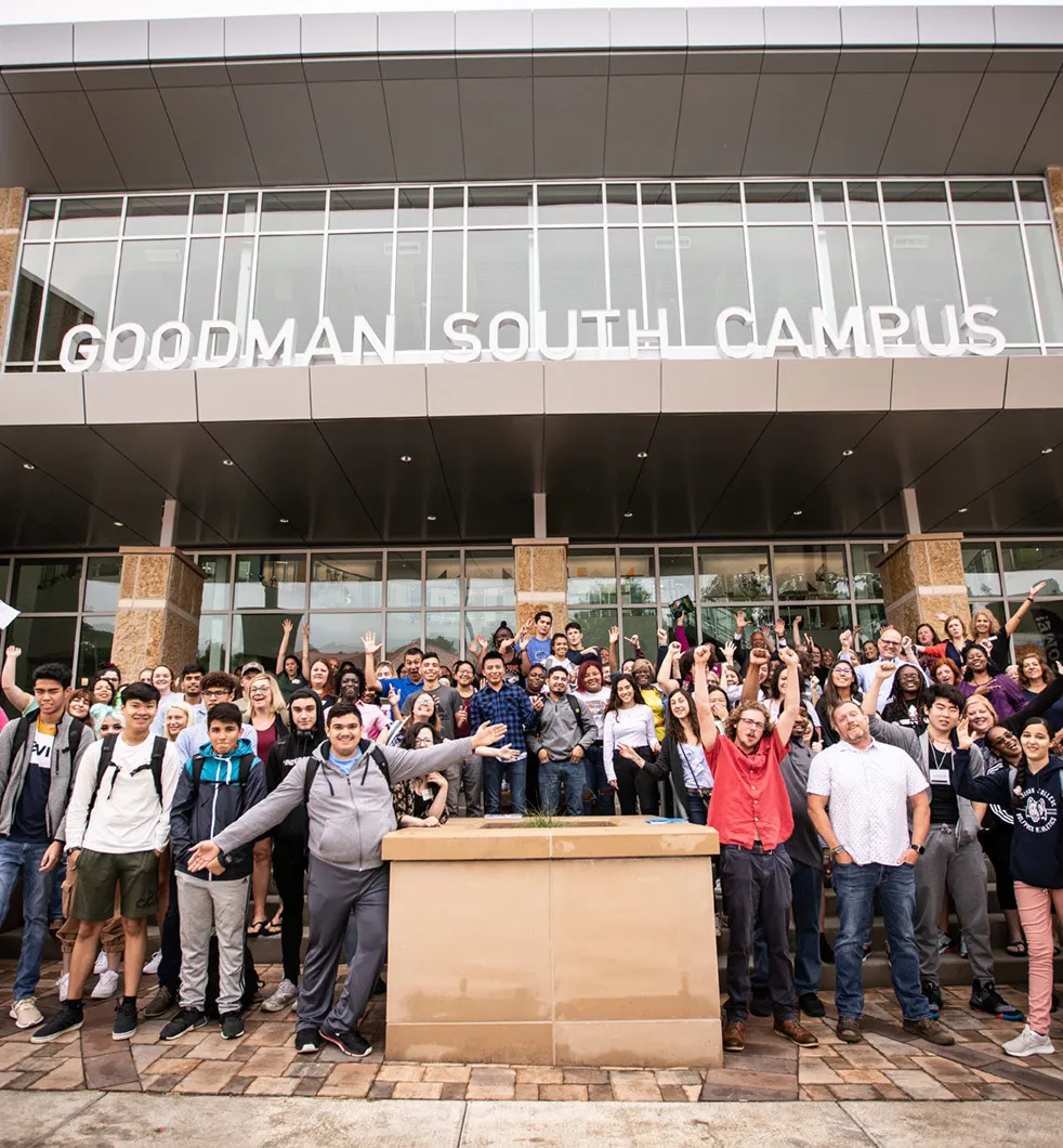 Goodman South students cheering on the front steps