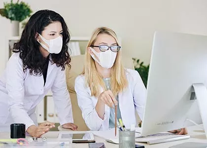 masked healthcare professionals saving the world one patient at a time. 