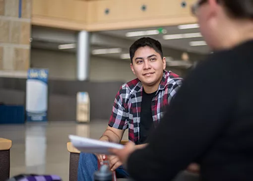 student and counselor in conversation