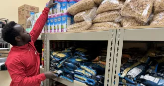 Janvier Mukunzi volunteers at the Cupboard Student Food Pantry