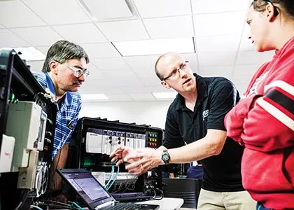 Industrial Electro-Mechanical Image of Instructor and Students