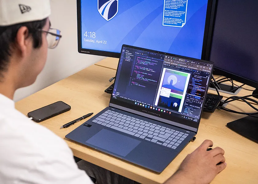 student using CSS and HTML to build a webpage