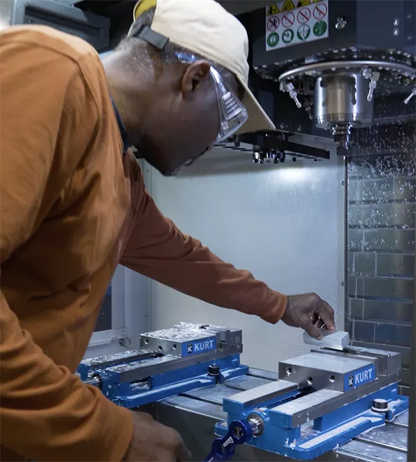 manufacturing student working with a milling machine