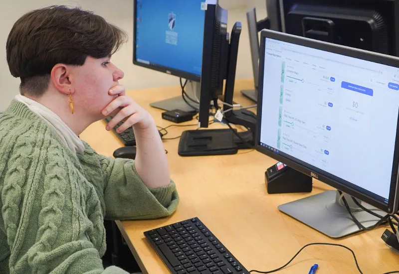 information technology student reviewing API documentation for Python