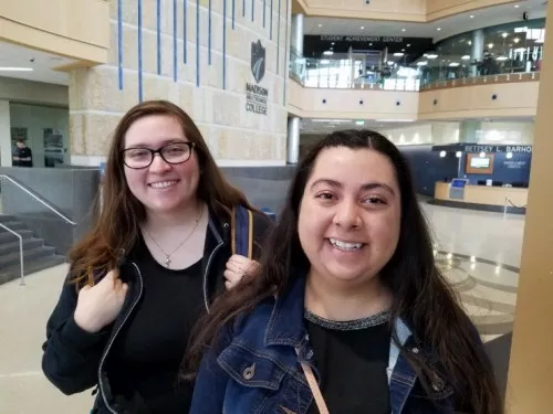 Liz and Nancy Quezada stand together. 