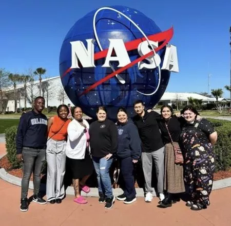 Madison College student Patricio Tinoco poses at the Kennedy Space Center while at the DREAM Scholar conference in Florida.
