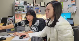 Madison College academic advisor Nidia Villatoro works with a student.