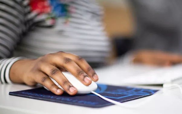 hand on a computer mouse