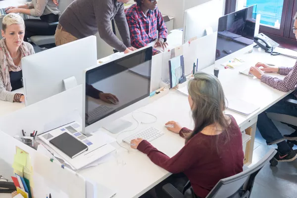 graphic design students in class