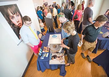 Students at photography portfolio show