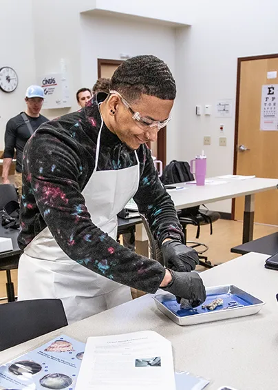 health student working in a biology lab