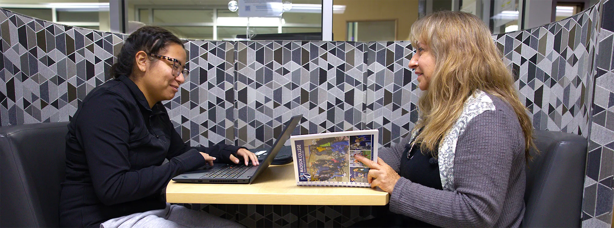 Samantha and Nora Hernandez studying together at a table