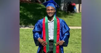 A photo of Grace Zongo in his graduation gown and cap