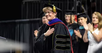 Turina Bakken in regalia at graduation
