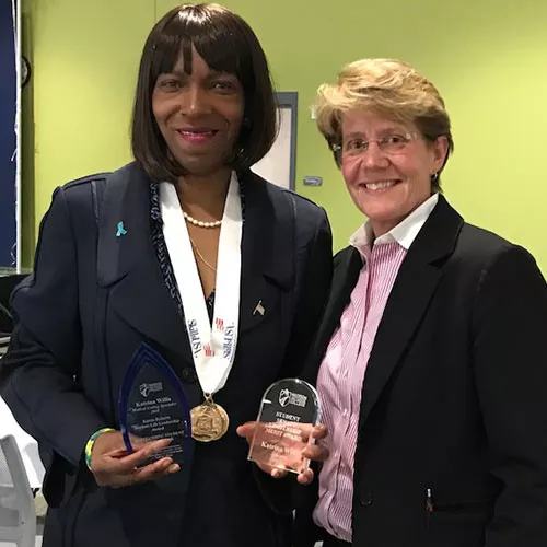 Dr. Bakken with an award winner