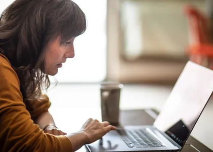 student studying ux on laptop