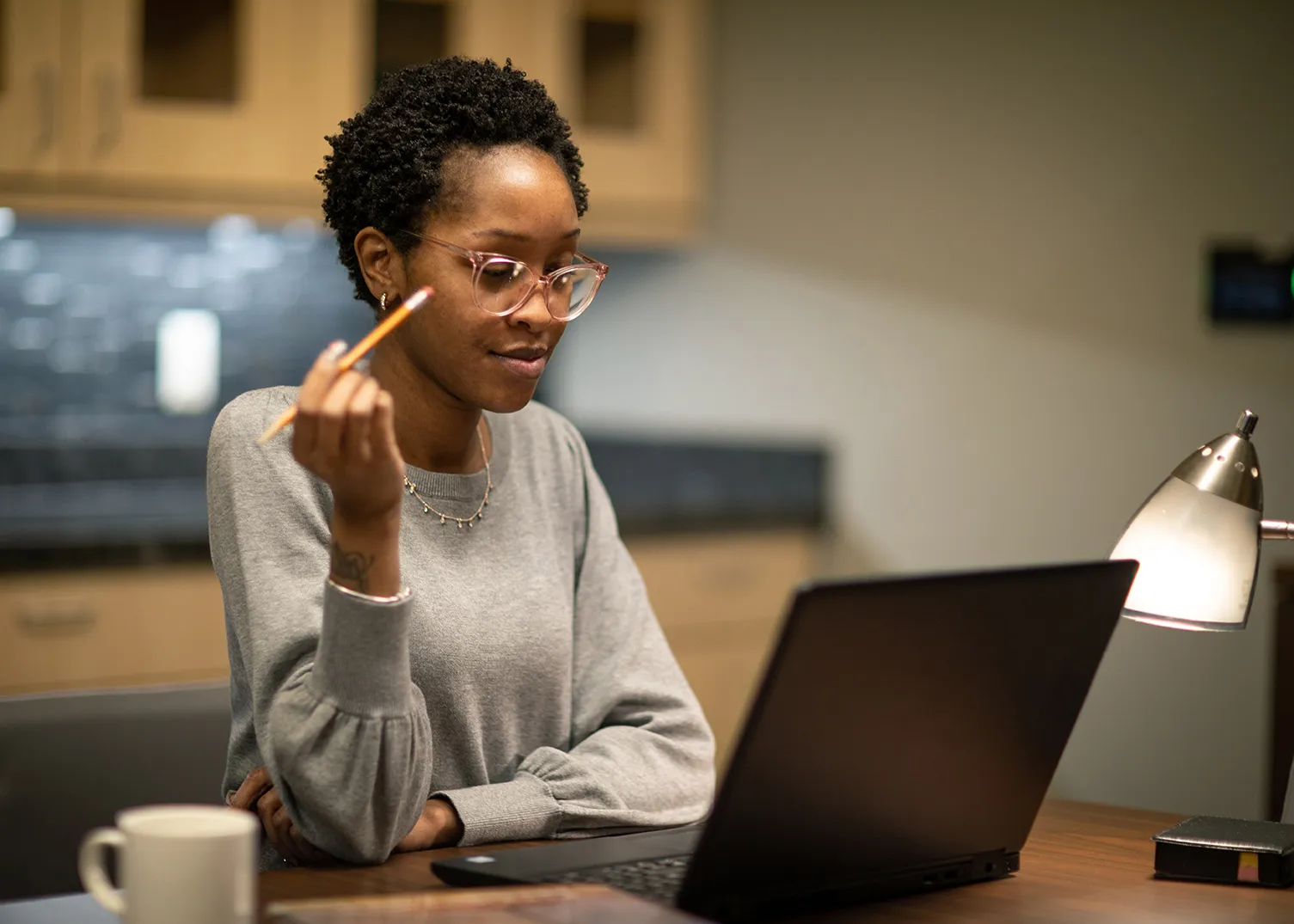 student studying UI on laptop