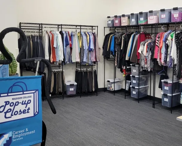 racks of clothing available to students for interviews